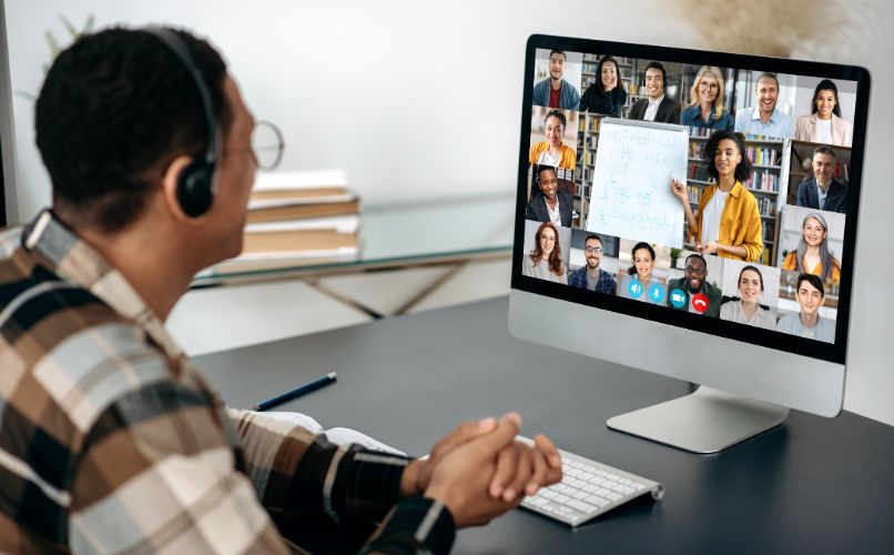 Person participating in a video conference call.