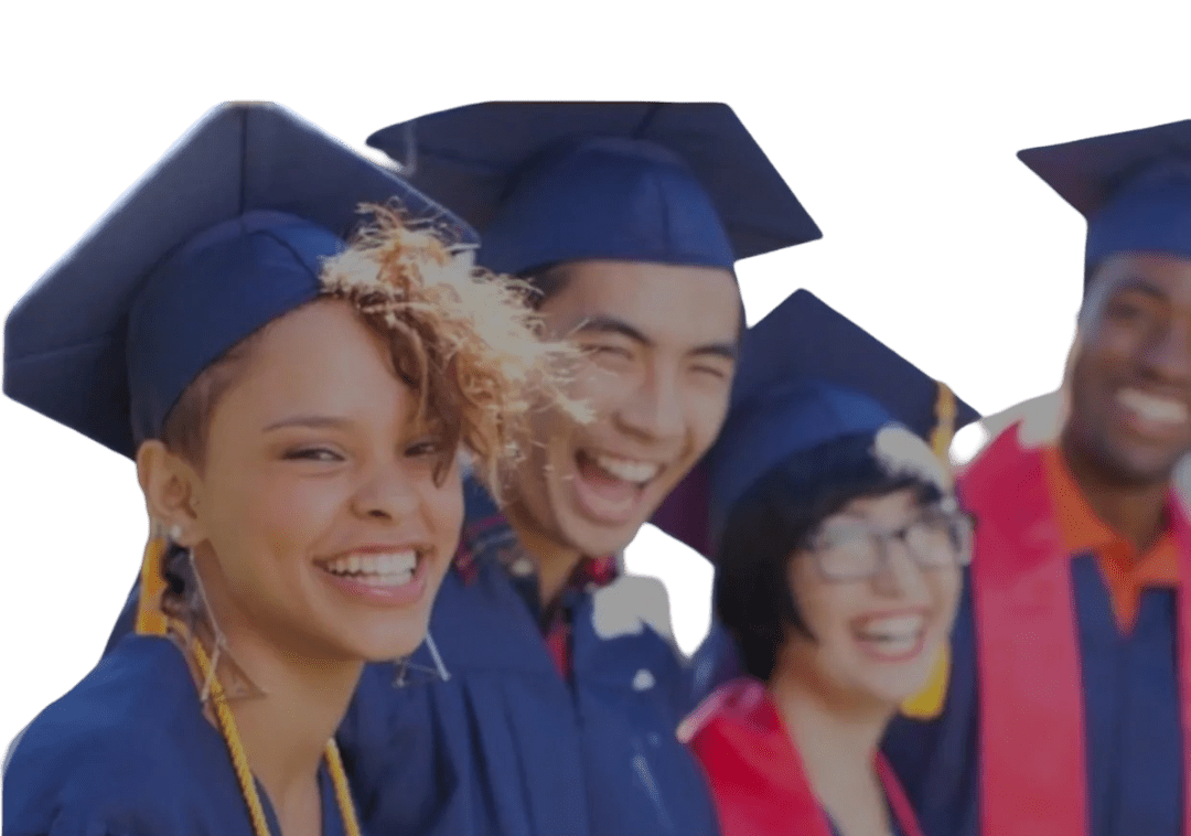 Graduates smiling in blue caps and gowns.